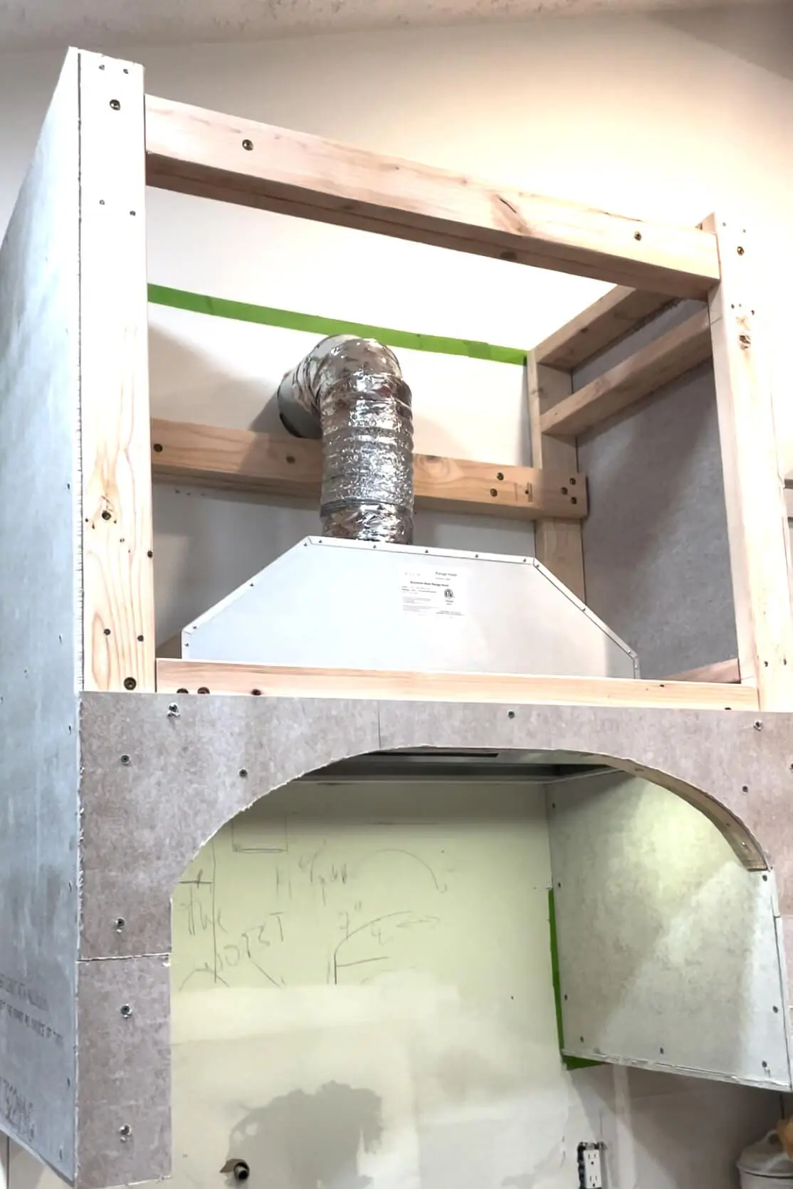 Venting a DIY stone range hood to the outside.